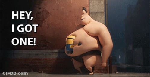 Sumo Wrestler With Minion On Belly Saying Hey I Got One GIF