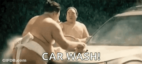 Sumo Wrestlers Washing A Car GIF