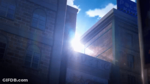 Sun Shining Through Building Windows With Pole GIF