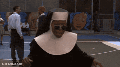 Sunglass-Wearing Nun In White Hat On Basketball Court GIF