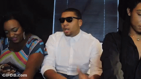 Sunglasses White Shirt Man Talking To Two Women GIF