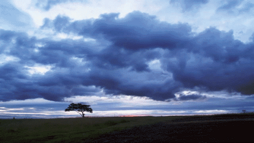 Sunrise Thick Grey Clouds GIF