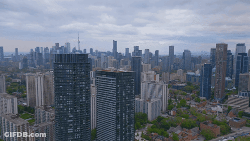 Sunset Over City Skyline GIF