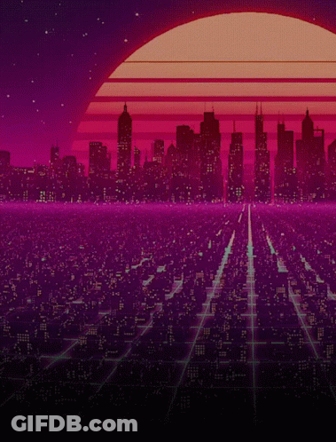 Sunset Over City With Grid Of Buildings GIF