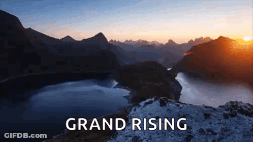 Sunset Over Lake And Mountains Saying Grand Rising GIF