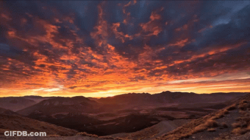 Sunset Over Ocean With Good Morning In Blue GIF