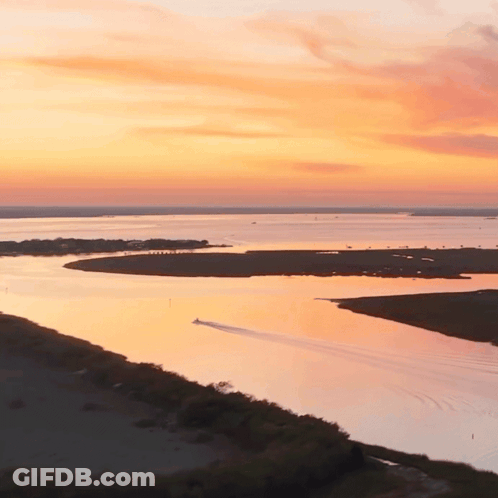 Sunset Over Water With Island GIF