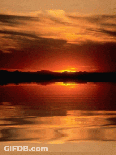 Sunset Over Water With Mountains GIF
