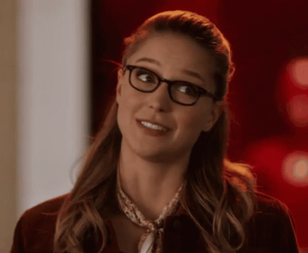 Super Girl Shrug Pose GIF