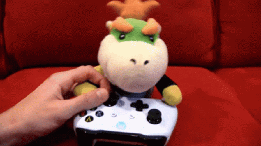 Super Mario Bowser Plush Playing Xbox GIF