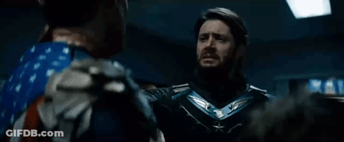 Superhero And American Flag Costumed Men GIF