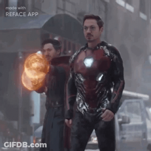 Superhero And Wizard Holding Fireball GIF