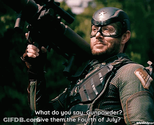 Superhero Holding Gun Asking What Do You Say Gunpowder GIF