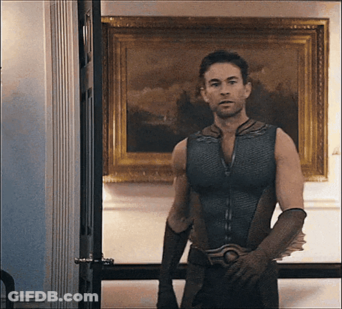 Superhero Man In Front Of Painting GIF