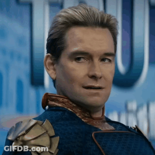 Superhero Man Standing In Front Of Tu Sign GIF