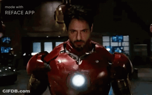 Superhero Next To Wizard Holding Fireball GIF