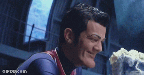 Superhero Smiling Holding Cake GIF