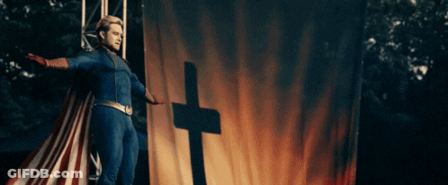Superhero Standing Before Cross Flag GIF