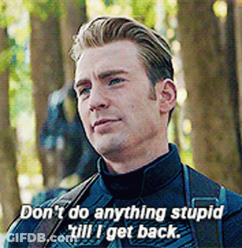 Superhero Talking To Another Man GIF