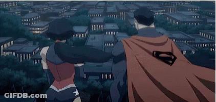 Superman And Lois Lane Are Looking At The Moon Over A City . GIF