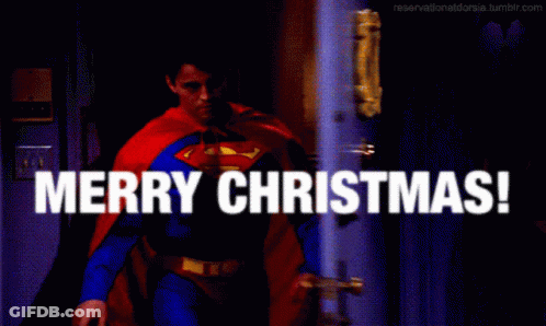Superman Costume Man Saying Merry Christmas GIF