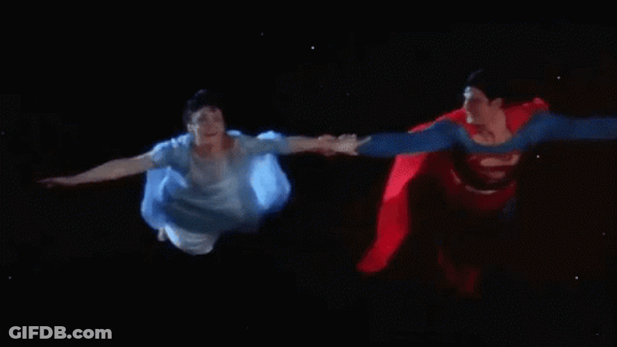 Superman Flying A Woman GIF