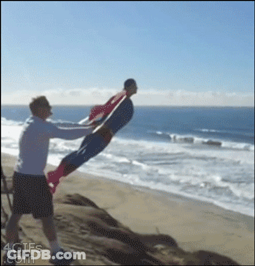 Superman Flying At The Beach GIF