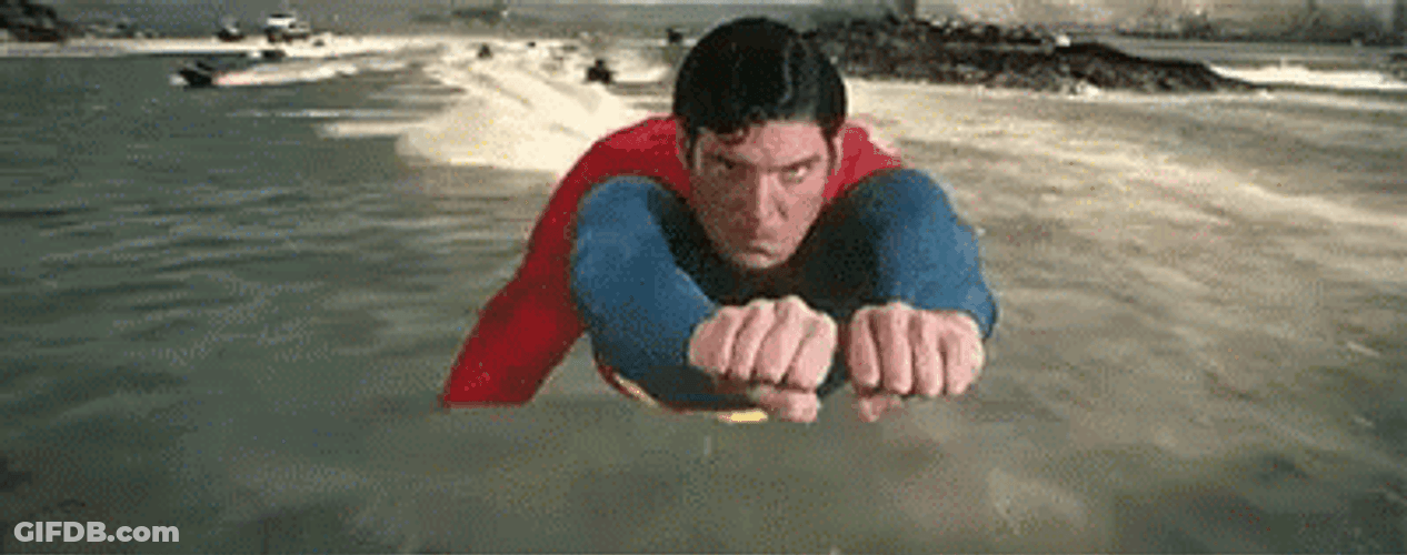 Superman Flying With Clenched Fist GIF