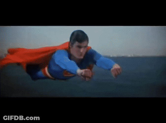 Superman Flying With Skyscrapers GIF