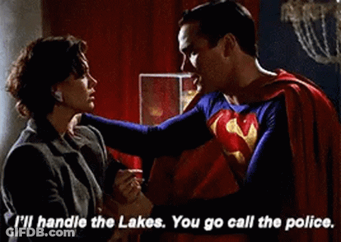 Superman Holding Woman's Hand And Talking GIF