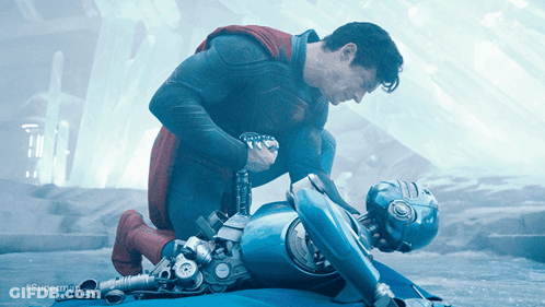 Superman Kneeling Next To Robot #Superman GIF
