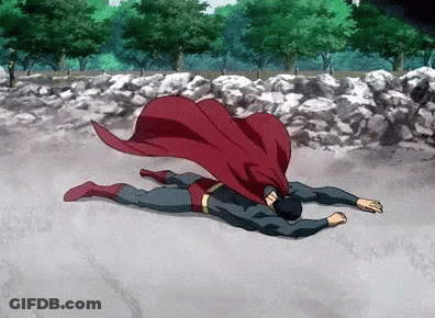 Superman Laying On Ground With Red Cape GIF