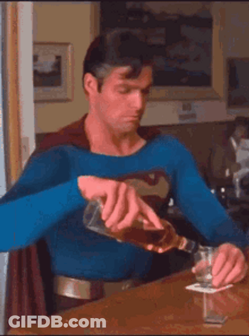 Superman Pouring A Shot GIF