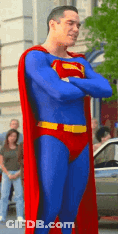 Superman Speaking With His Hands Folded GIF