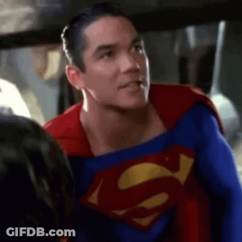 Superman Talking To Another Man GIF