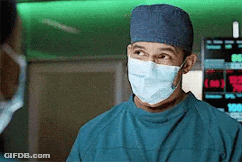 Surgeon Wearing Mask And Cap GIF