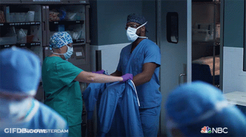 Surgeons Performing Surgery On Patient GIF