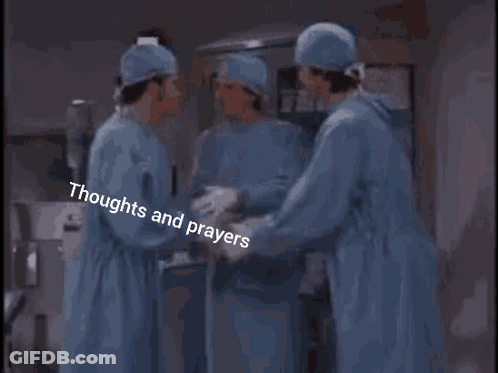 Surgeons Standing In Operating Room GIF