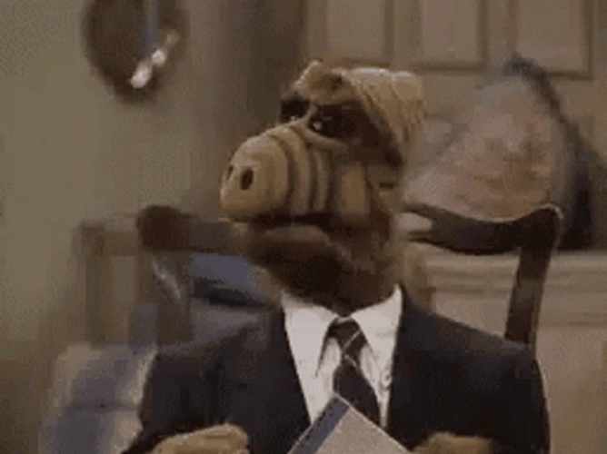 Surprised Alf Wearing Suit GIF