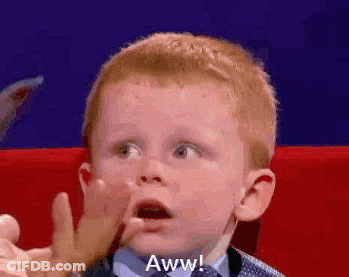 Surprised Boy Saying Aww GIF
