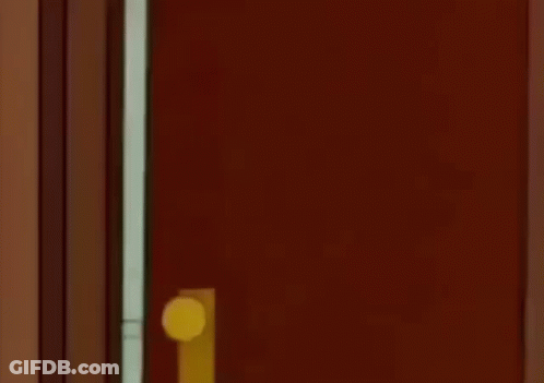 Surprised Cartoon Character In Doorway GIF