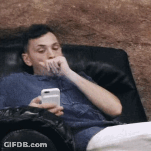 Surprised Cat On Couch Under Starttamilchat.in Sign GIF