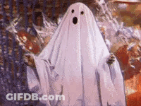 Surprised Ghost Standing In Pumpkin Patch GIF