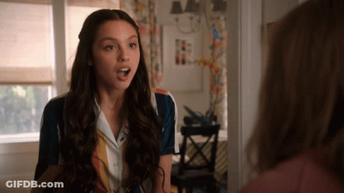 Surprised Girl Looking At Another Girl GIF