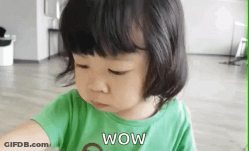 Surprised Little Girl In Green Shirt GIF