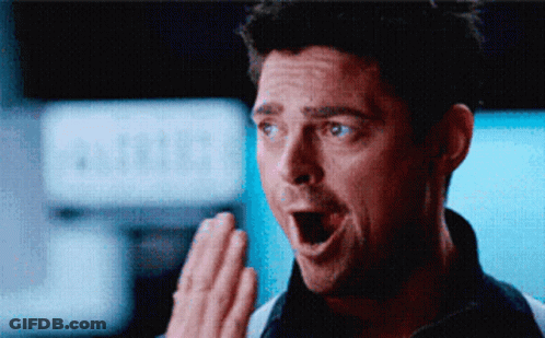Surprised Man Covering Mouth GIF