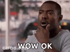 Surprised Man Holding Hand To Chin GIF