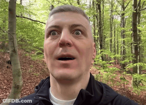 Surprised Man In Forest GIF