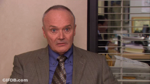 Surprised Man In Suit And Tie GIF