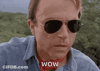 Surprised Man In Sunglasses Red Scarf Wow GIF